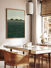 Illustrative landscape wall art print showing green mountains, a light blue sky with clouds, and a dark blue ocean with white waves. - Image 2