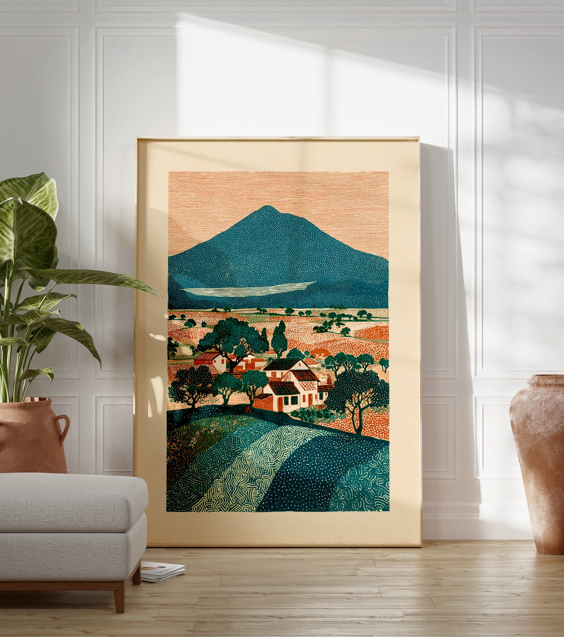 Illustrative landscape art print of a mountain, village, and fields with trees, in teal, orange, and cream colors. - Image 3