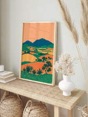 Mid-century modern landscape wall art print featuring green mountains, orange and yellow fields, and green plants. - Image 3