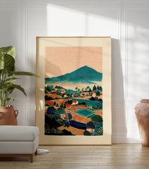 Stylized landscape wall art print depicting a mountain village with fields, trees, and houses under an orange textured sky. - Image 3