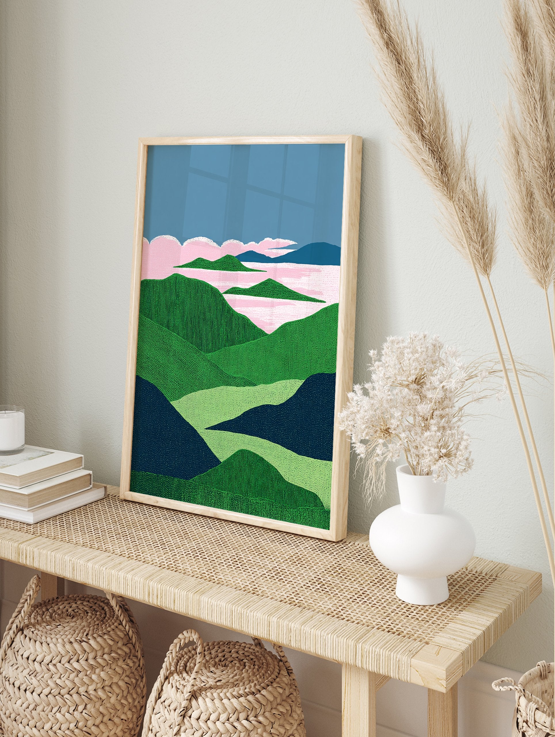 Textured landscape wall art featuring green hills, a pink lake, and blue sky with pink clouds, in an illustrative style. - Image 3