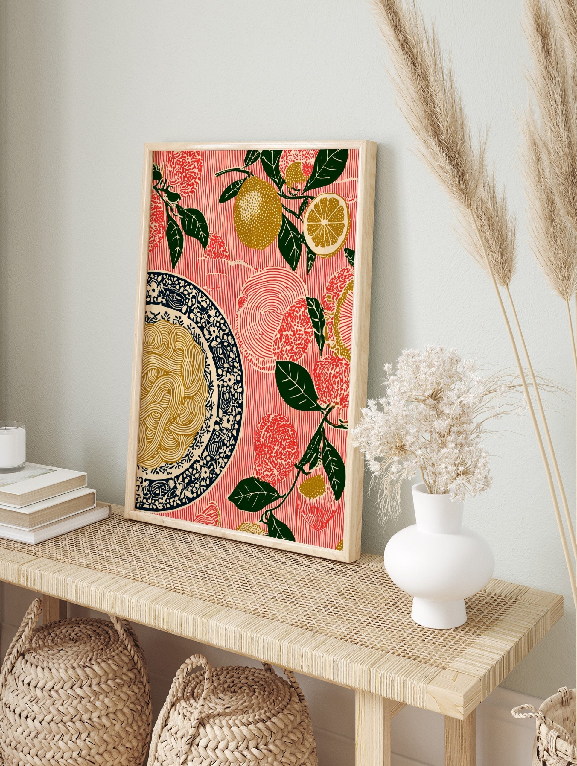 Illustrative lemon and spaghetti wall art print with green leaves on a red striped background, in an alternate framed mockup