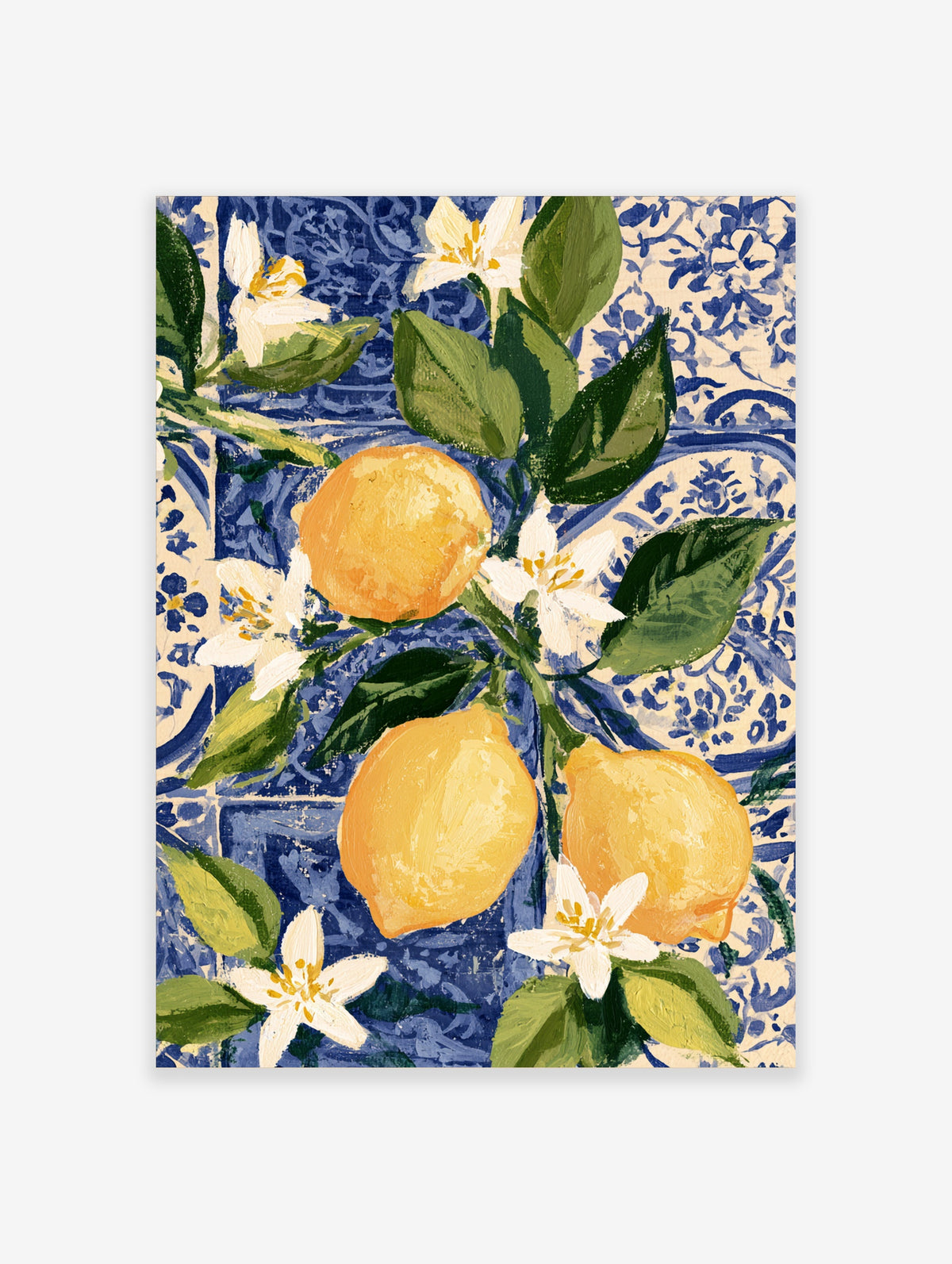 Lemon wall art print with yellow lemons, white blossoms, and green leaves on a blue and white tile pattern