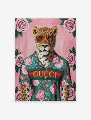 Fashionable leopard poster wearing aviator sunglasses and a floral Gucci shirt on a pink background with pink roses.