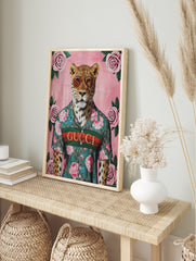 Fashionable leopard poster wearing aviator sunglasses and a floral Gucci shirt on a pink background with pink roses. - Image 4