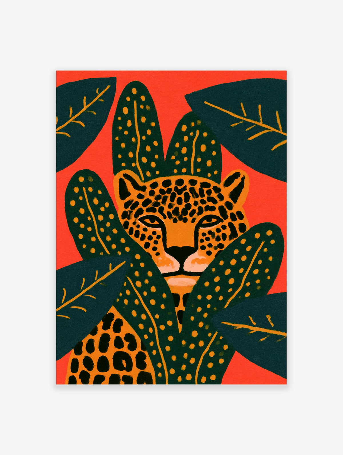 A leopard wall art print showing a spotted cat face looking through dark green tropical leaves on a bright orange background