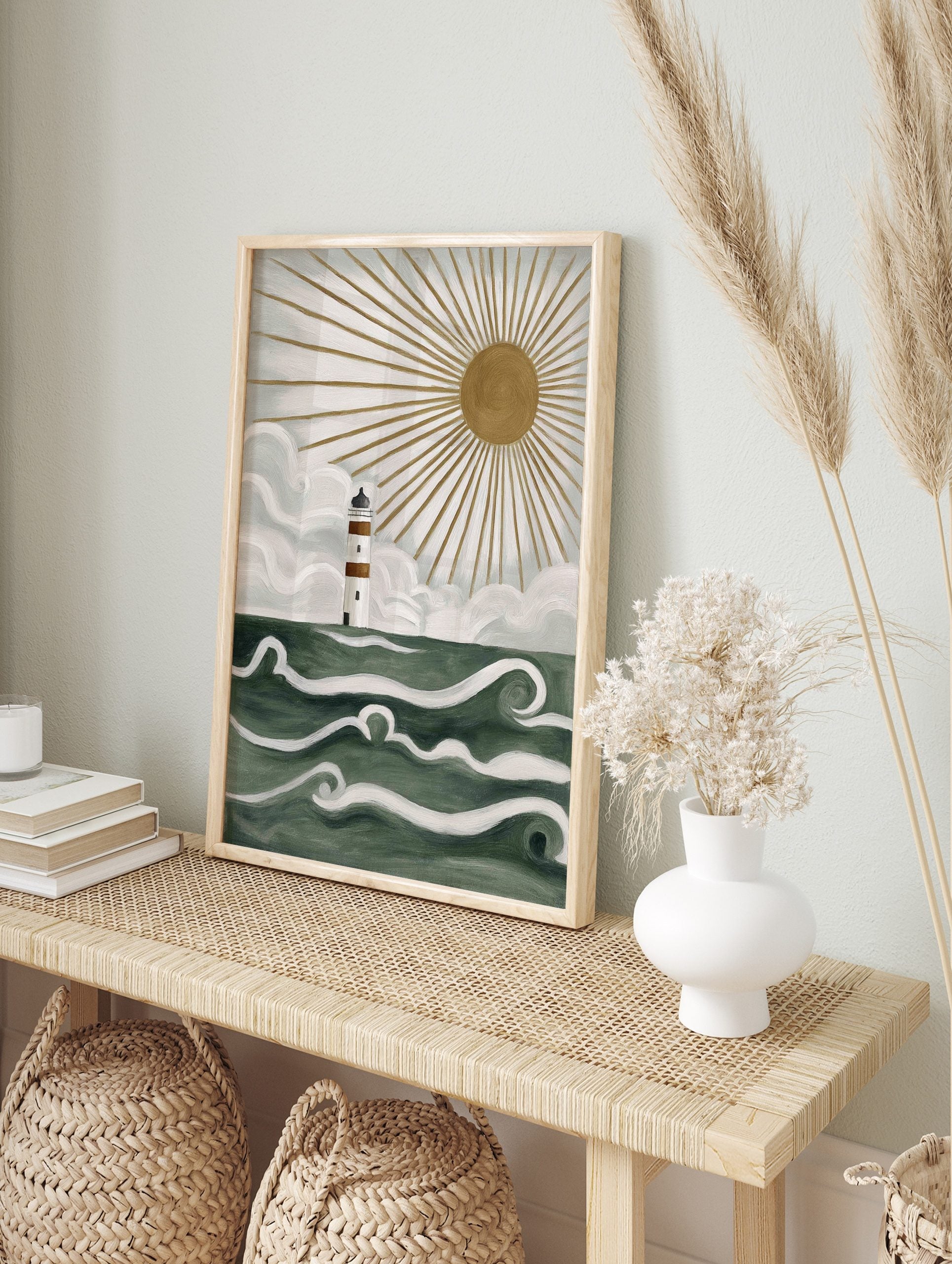 Illustrative lighthouse wall art with white and brown stripes, green ocean waves, and golden, in an alternate framed mockup