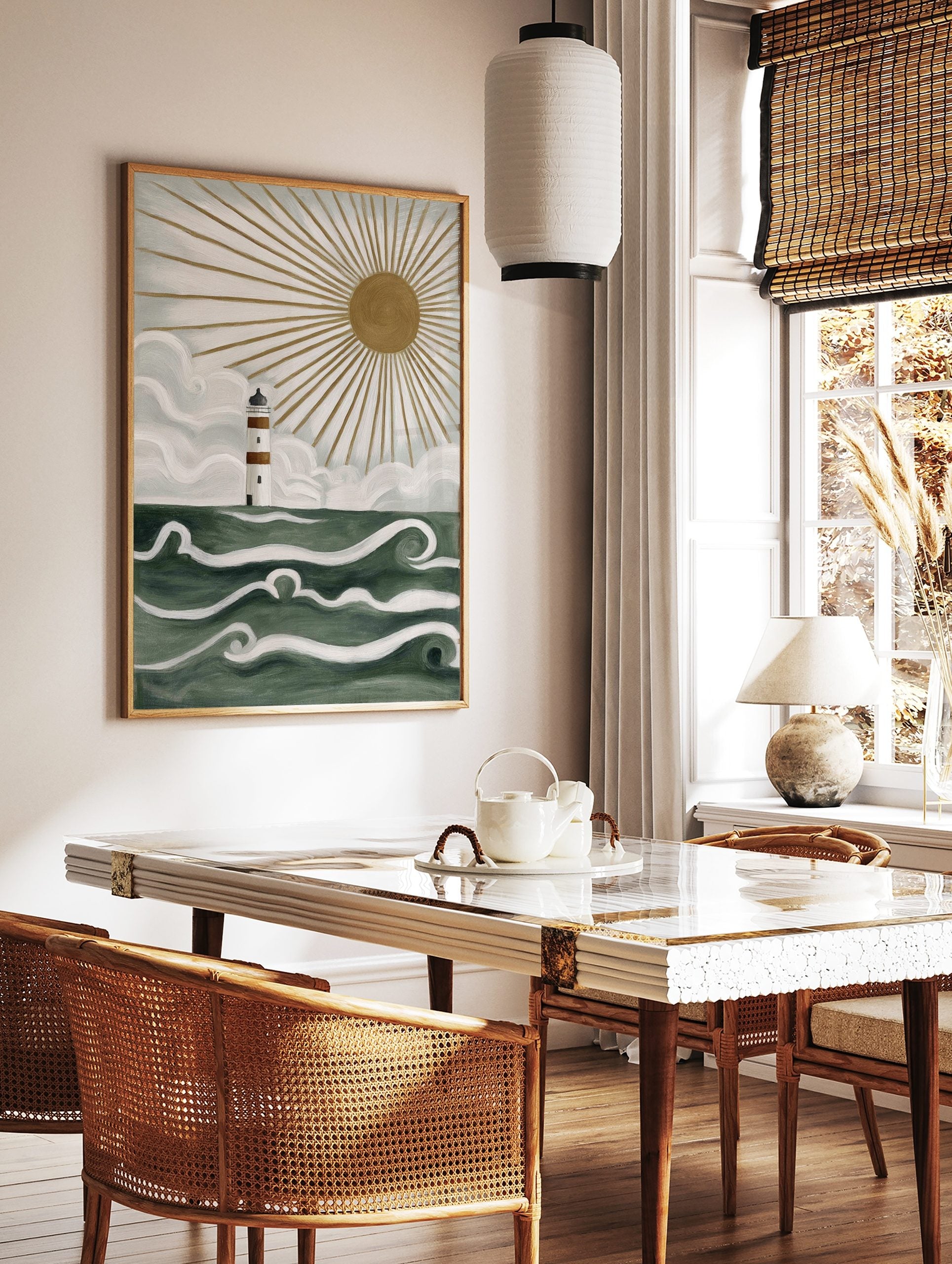 Illustrative lighthouse wall art with white and brown stripes, green ocean waves, and golden, in a styled room mockup