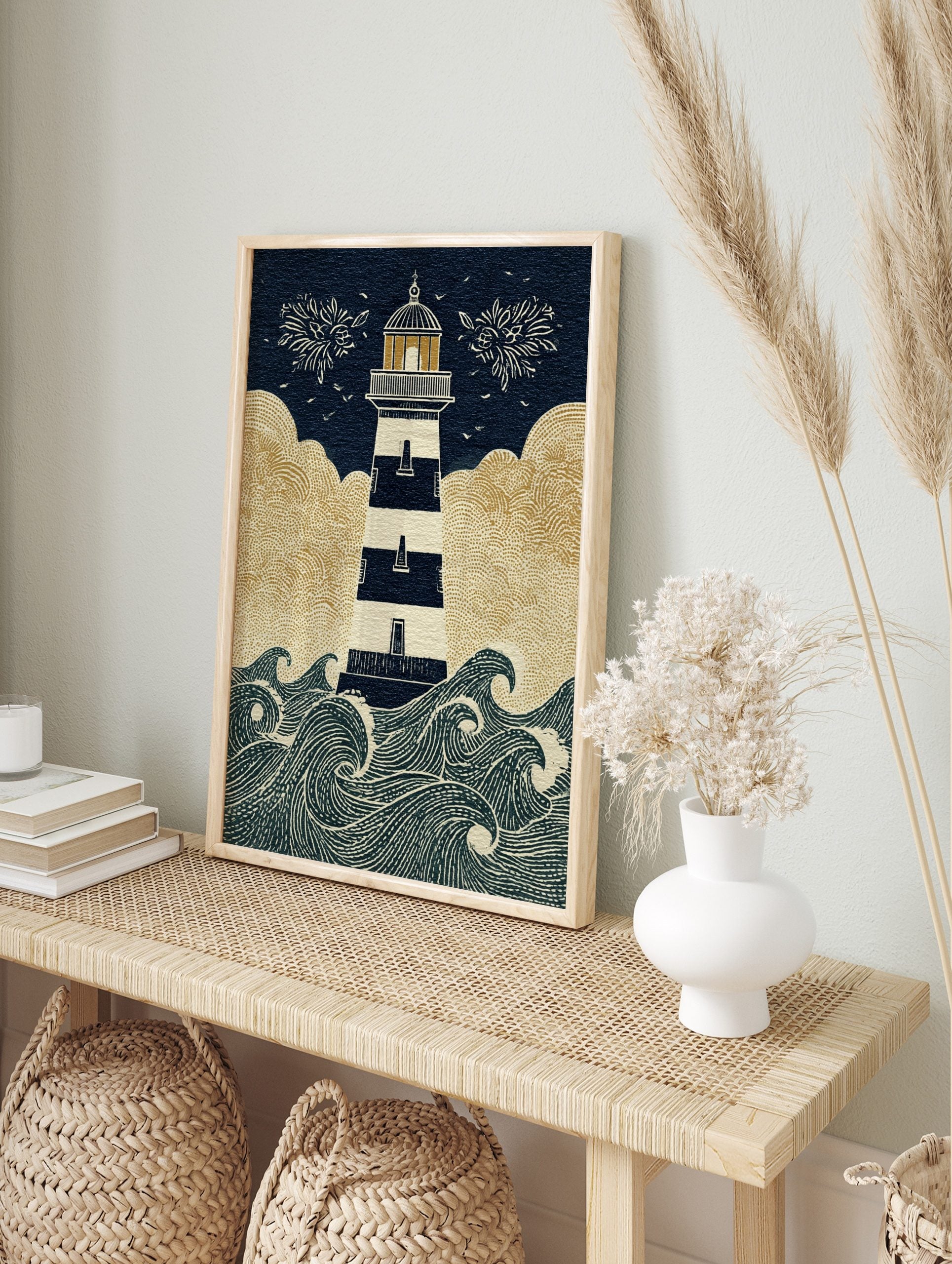 Illustrative lighthouse wall art with navy and white stripes, golden clouds, and crashing, in an alternate framed mockup