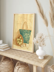 Still life illustration of green limes in a basket, a teal woven bag, and seashells on a, in an alternate framed mockup