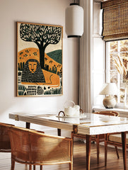 Modern illustrative lion wall art print with a black and orange patterned mane resting under a, in a styled room mockup