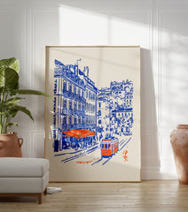 Lisbon Street Poster showing a blue and orange illustration of a city street with an orange tram, buildings, and a cafe. - Image 3