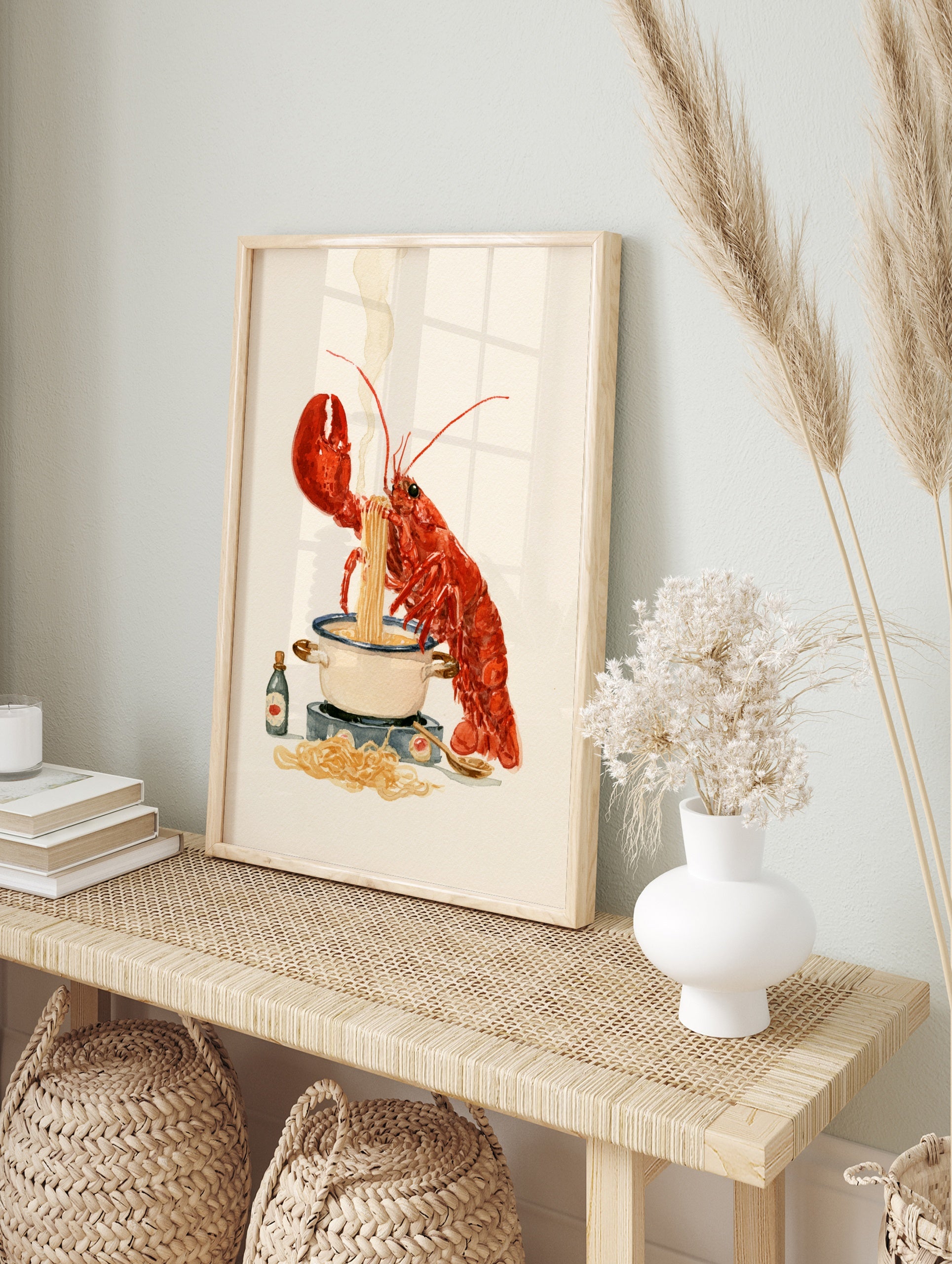 Red lobster cooking spaghetti in a pot with a wooden spoon, illustrative food wall art on a, in an alternate framed mockup