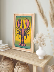 Vintage lobster illustration print with pink and red animal on yellow background and teal, in an alternate framed mockup