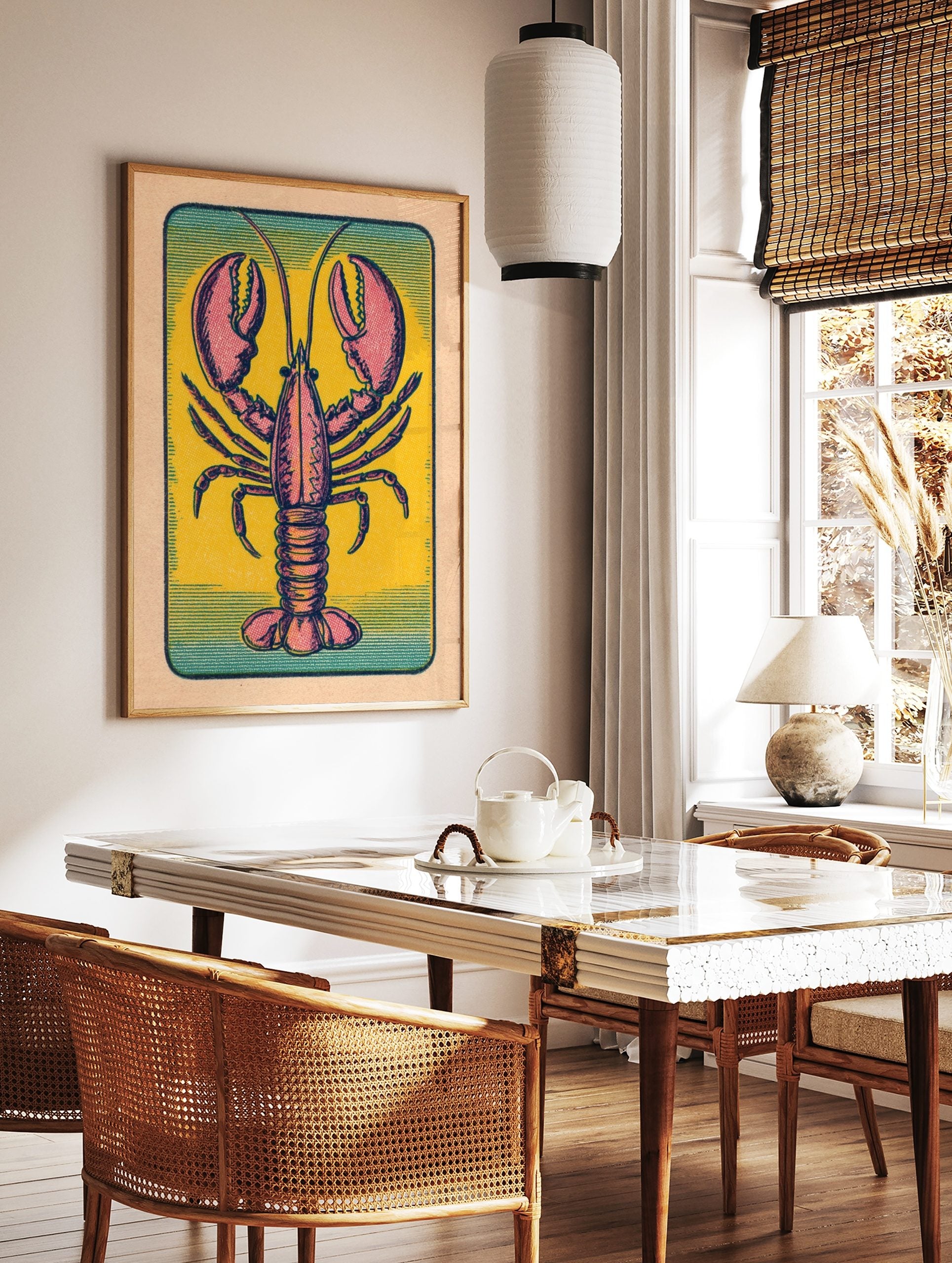 Vintage lobster illustration print with pink and red animal on yellow background and teal border in, in a styled room mockup