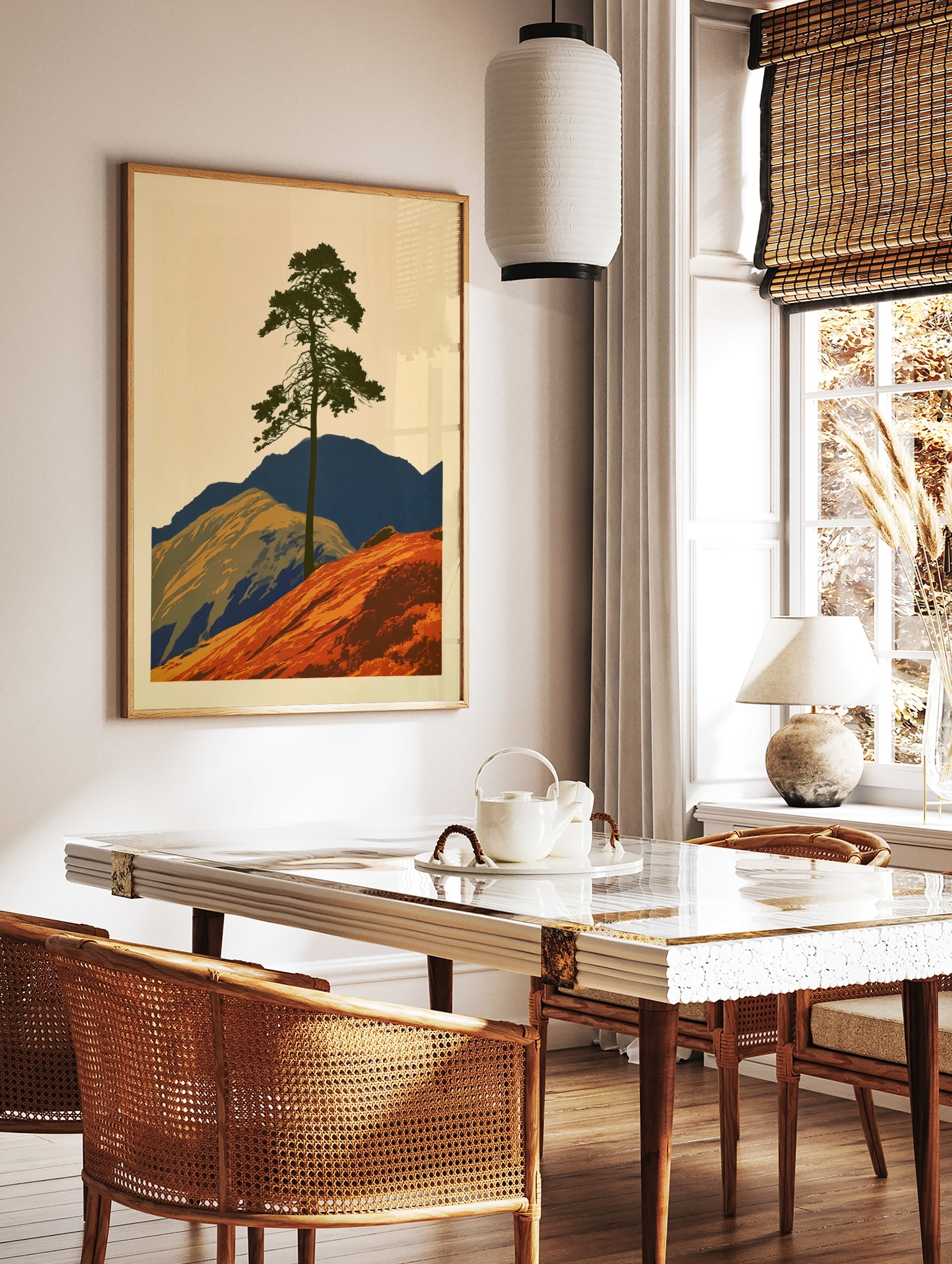 Graphic illustration of a lone pine tree on an orange hill with blue mountains, minimalist, in a styled room mockup
