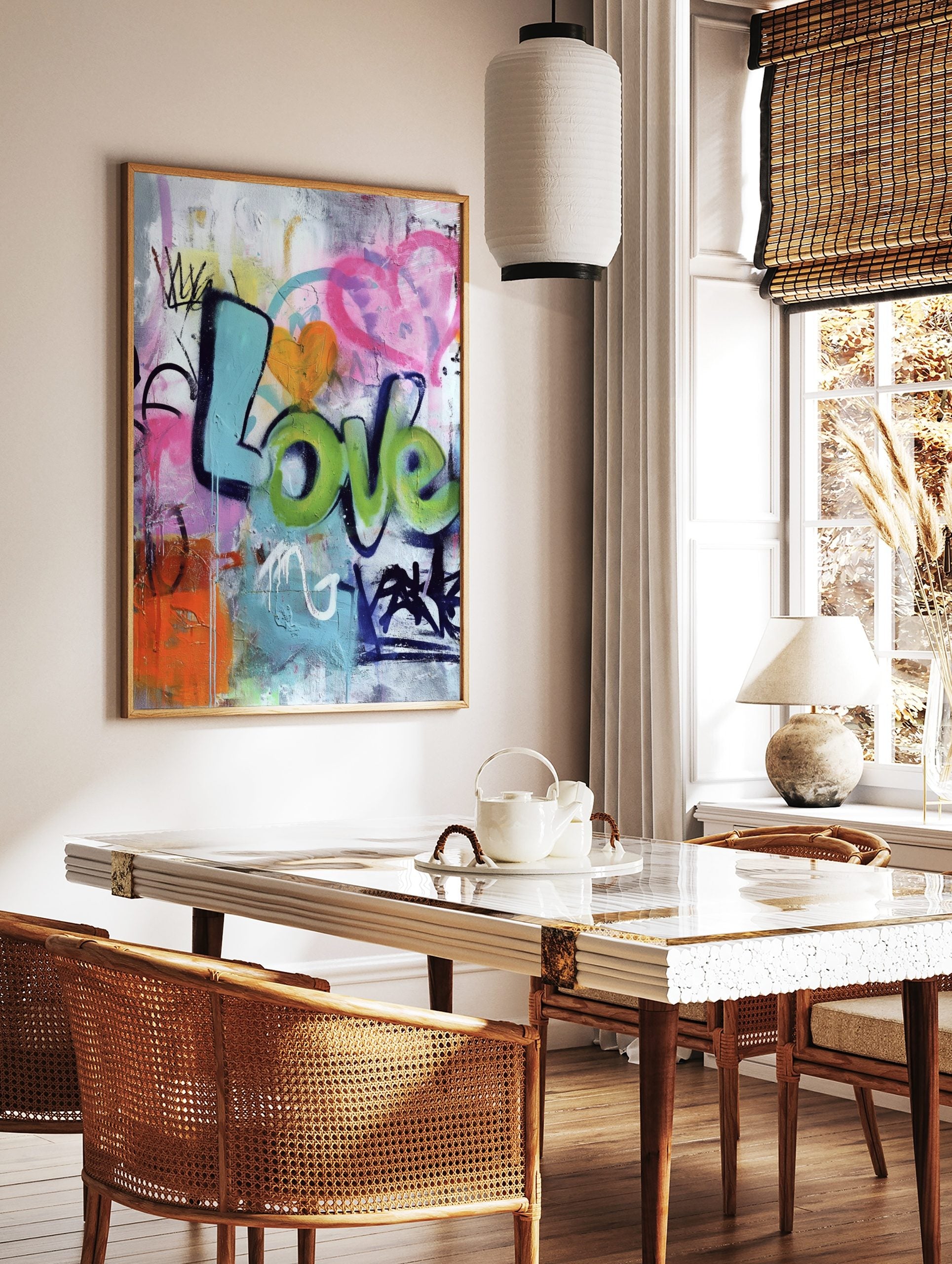Colourful graffiti wall art print with 'Love' in blue and green bubble letters, an orange heart, in a styled room mockup