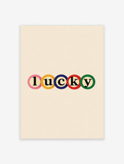 Lucky typography wall art print with colourful letters in circles on a neutral background