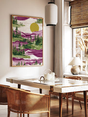 Illustrative magenta and green forest landscape with pine trees and a large yellow sun, with, in a styled room mockup