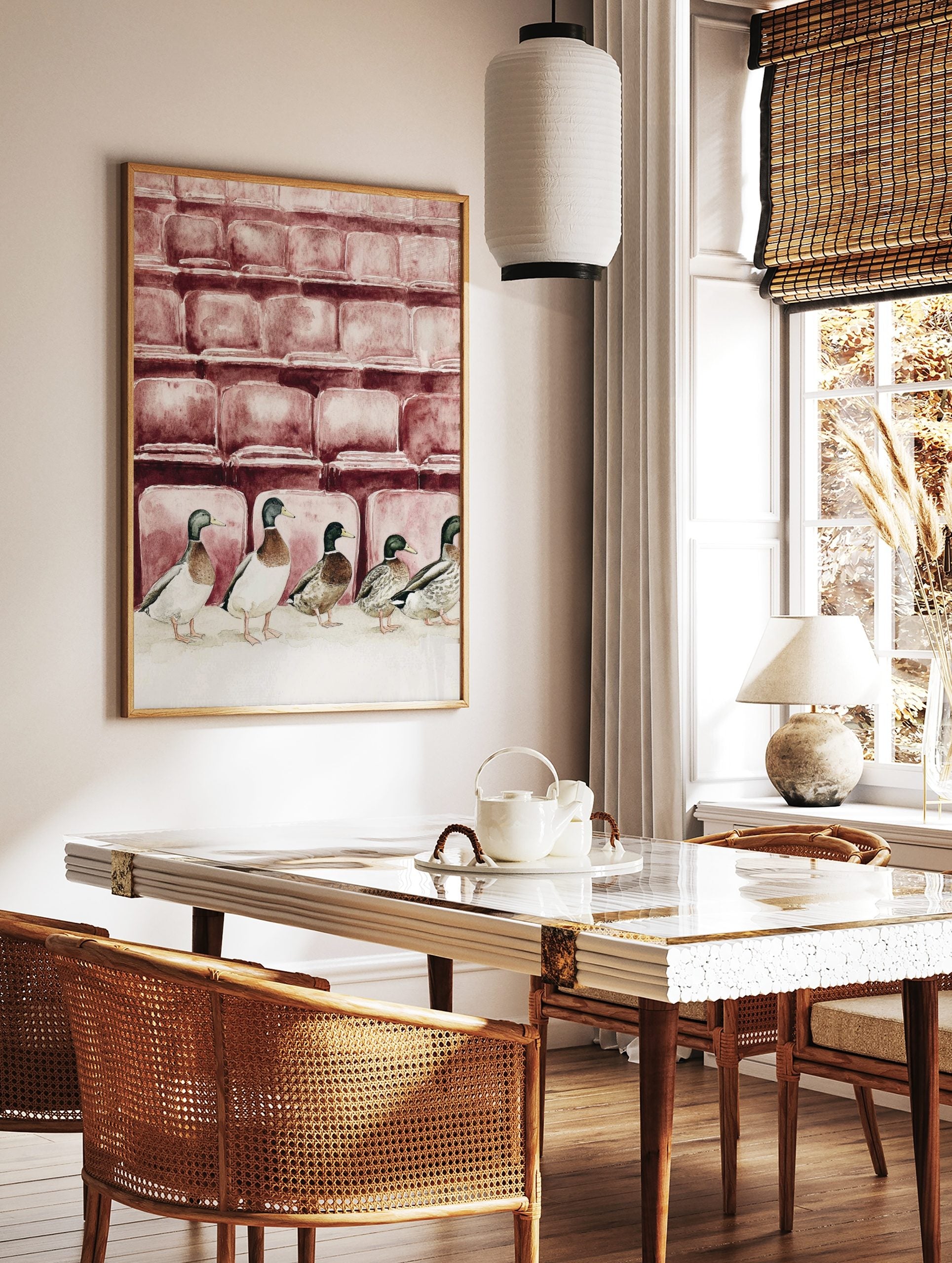 Watercolour illustration of five mallard ducks in a row in front of reddish-brown theatre seats, in a styled room mockup