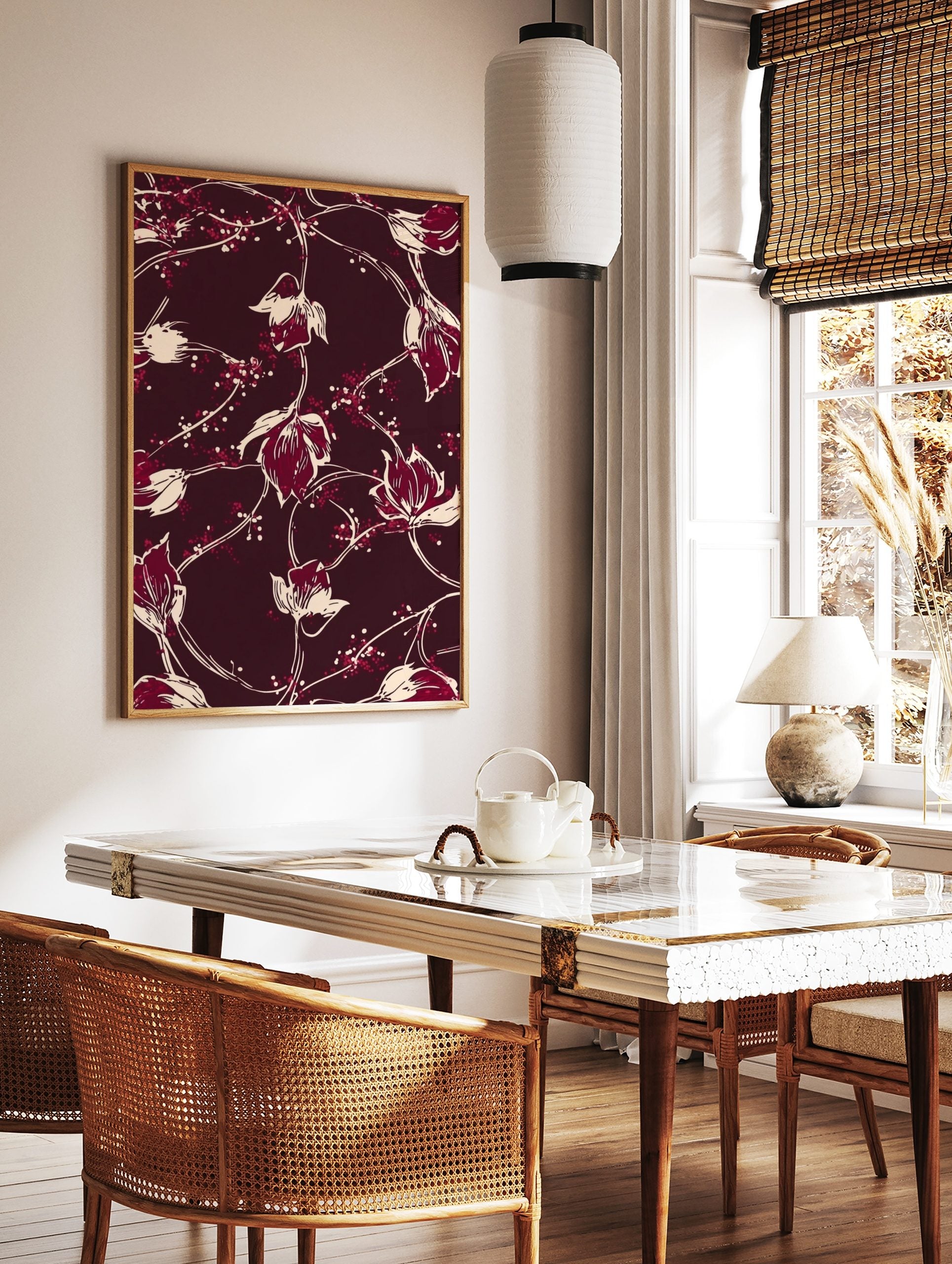 Maroon background with off-white and red illustrative floral vine pattern print, in a styled room mockup
