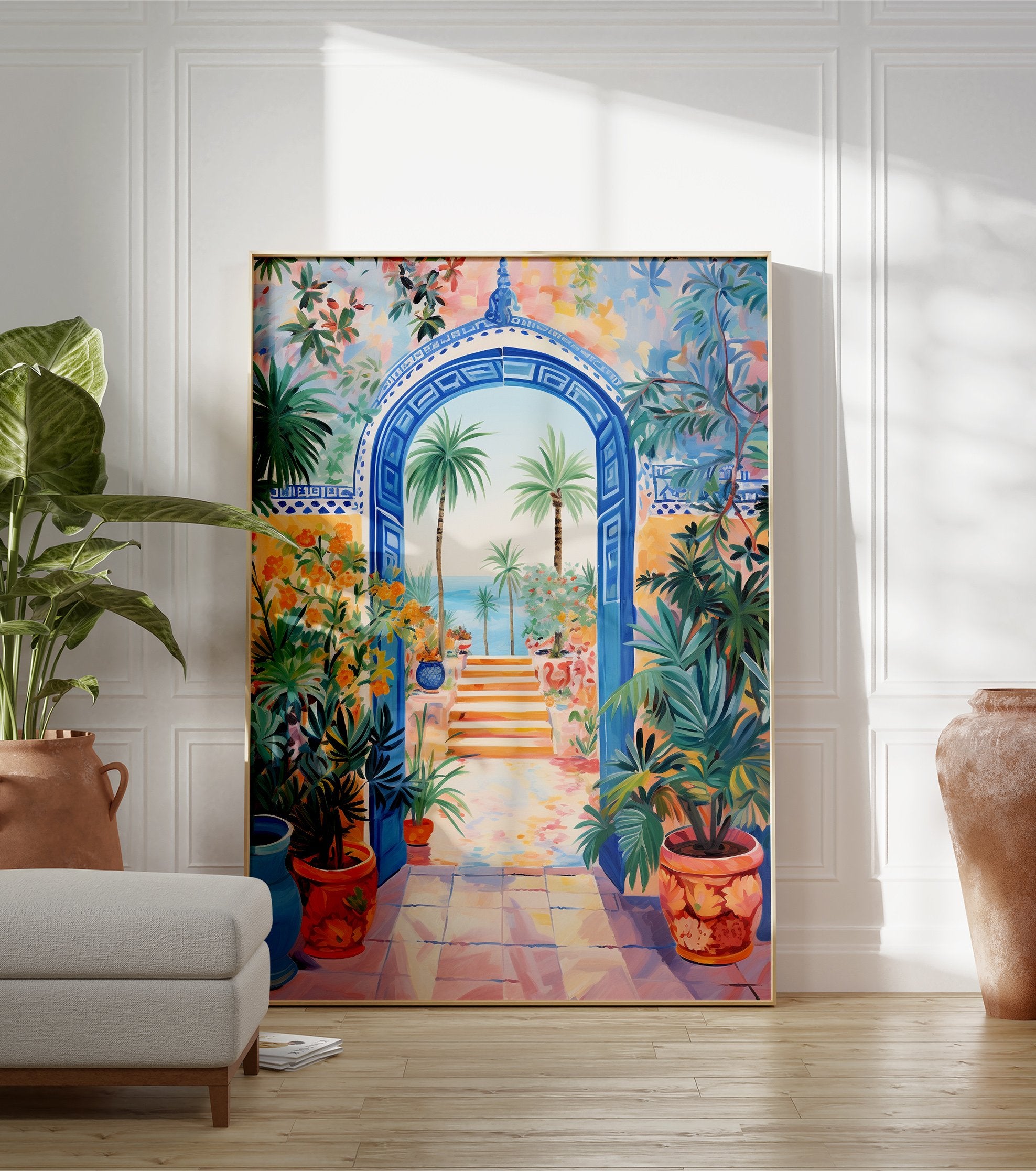 Vibrant Mediterranean Gateway Poster featuring a blue arched entrance, palm trees, ocean view, and colorful potted plants. - Image 3