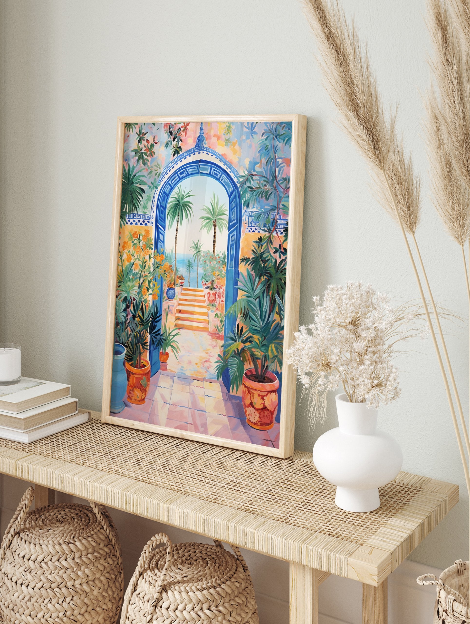 Vibrant Mediterranean Gateway Poster featuring a blue arched entrance, palm trees, ocean view, and colorful potted plants. - Image 4