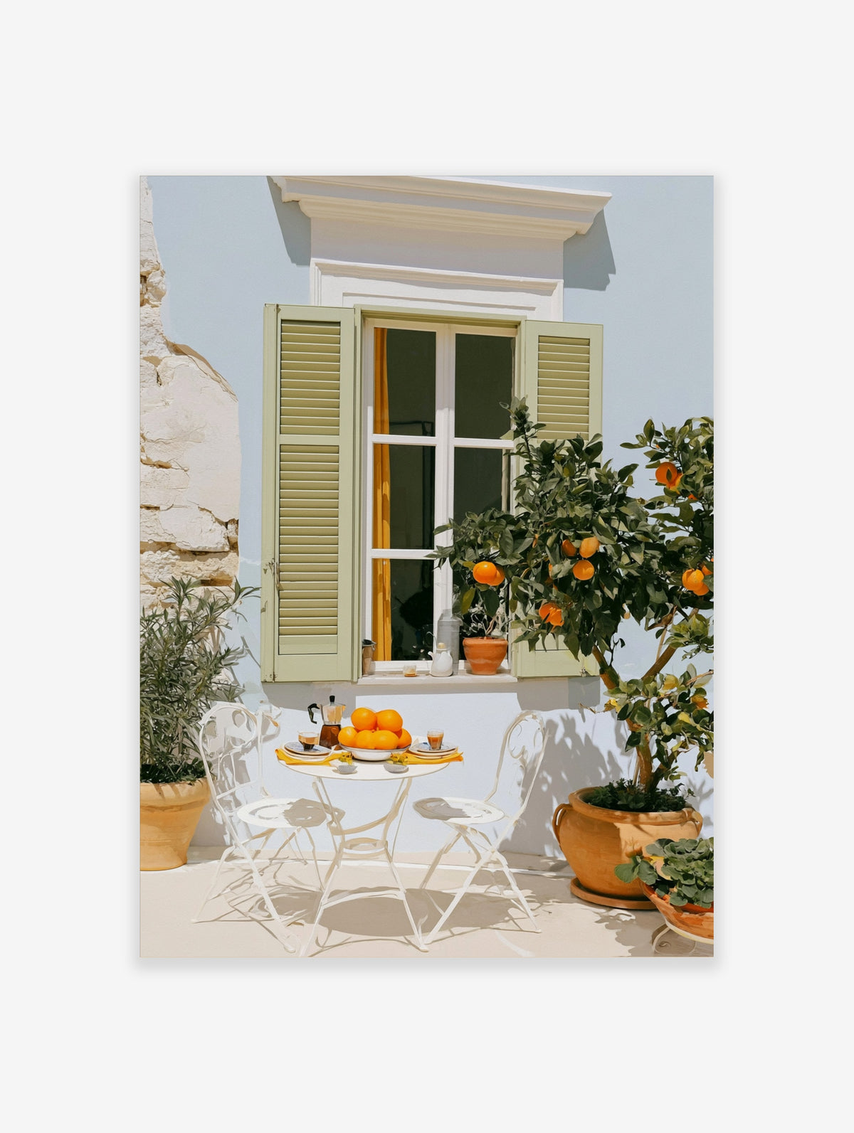 Mediterranean patio with orange tree, white bistro table, and pale blue shutters