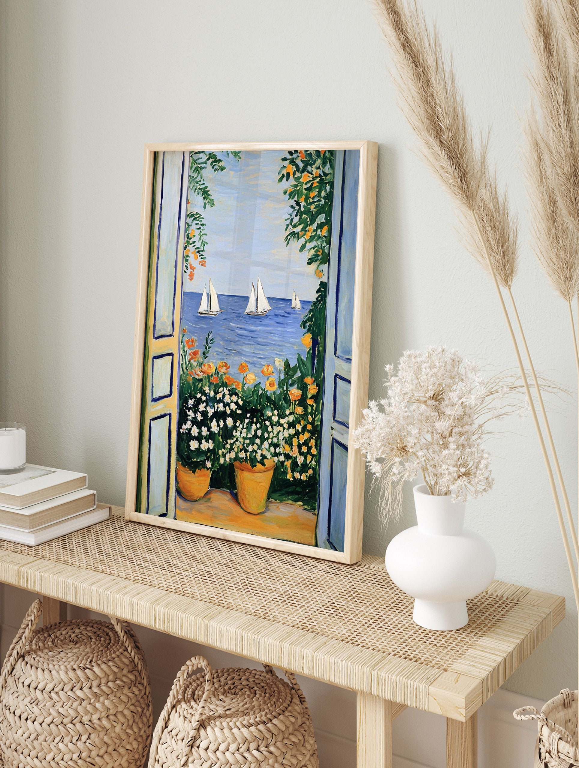 Vibrant Mediterranean sea view poster with open blue doors, potted white and orange flowers, and sailboats on blue water. - Image 4