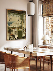Mediterranean coastal village painting with white buildings, blue sea, and an inviting dining patio scene. - Image 2
