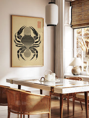 Minimalist black crab illustration with horizontal lines on beige paper, red grid in top right, in a styled room mockup