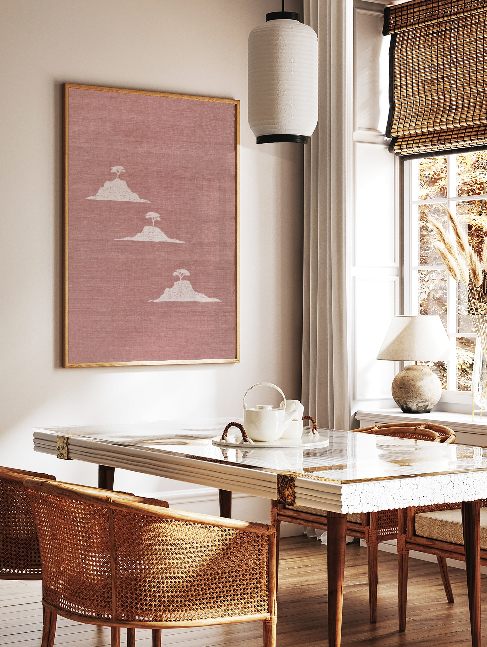 Minimalist landscape wall art featuring three white mesa hills with trees on a textured dusty pink, in a styled room mockup