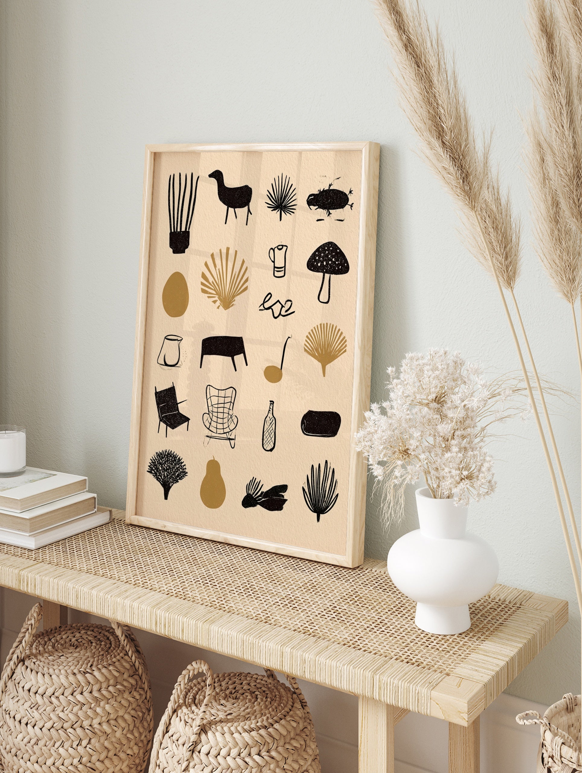 Minimalist grid illustration print with botanical, animal, and household icons in black on a, in an alternate framed mockup