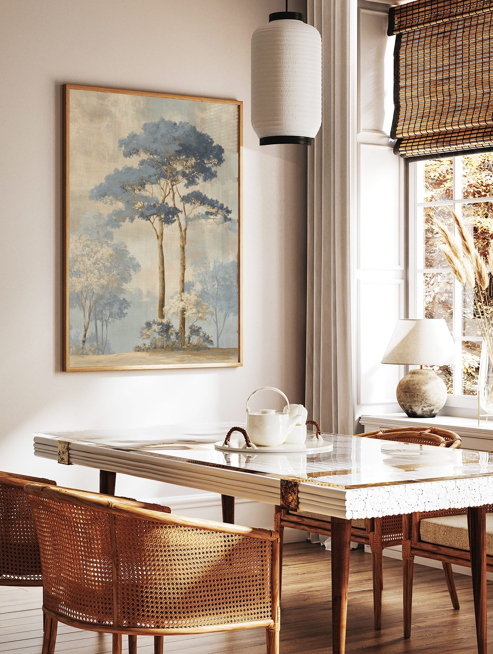Illustrative misty forest landscape art print with tall blue-leafed trees and white-blossomed bushes, in a styled room mockup