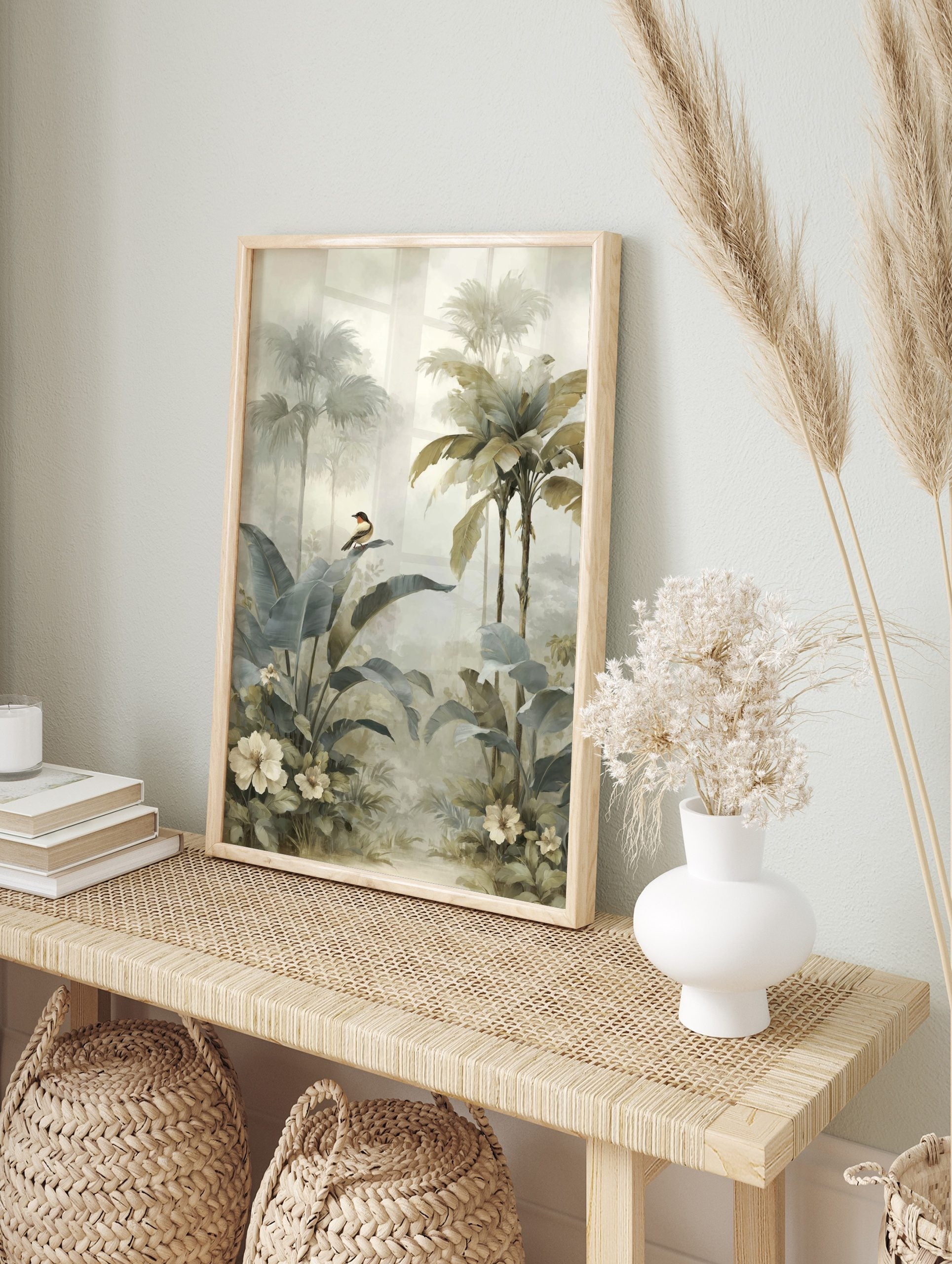 Misty tropical jungle art print with large green leaves, palm trees, a small bird, and white, in an alternate framed mockup