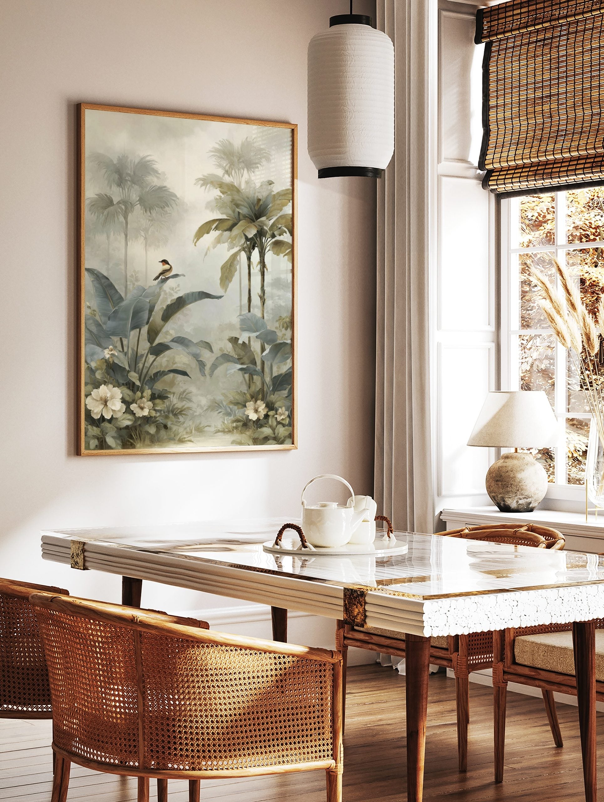 Misty tropical jungle art print with large green leaves, palm trees, a small bird, and white flowers, in a styled room mockup