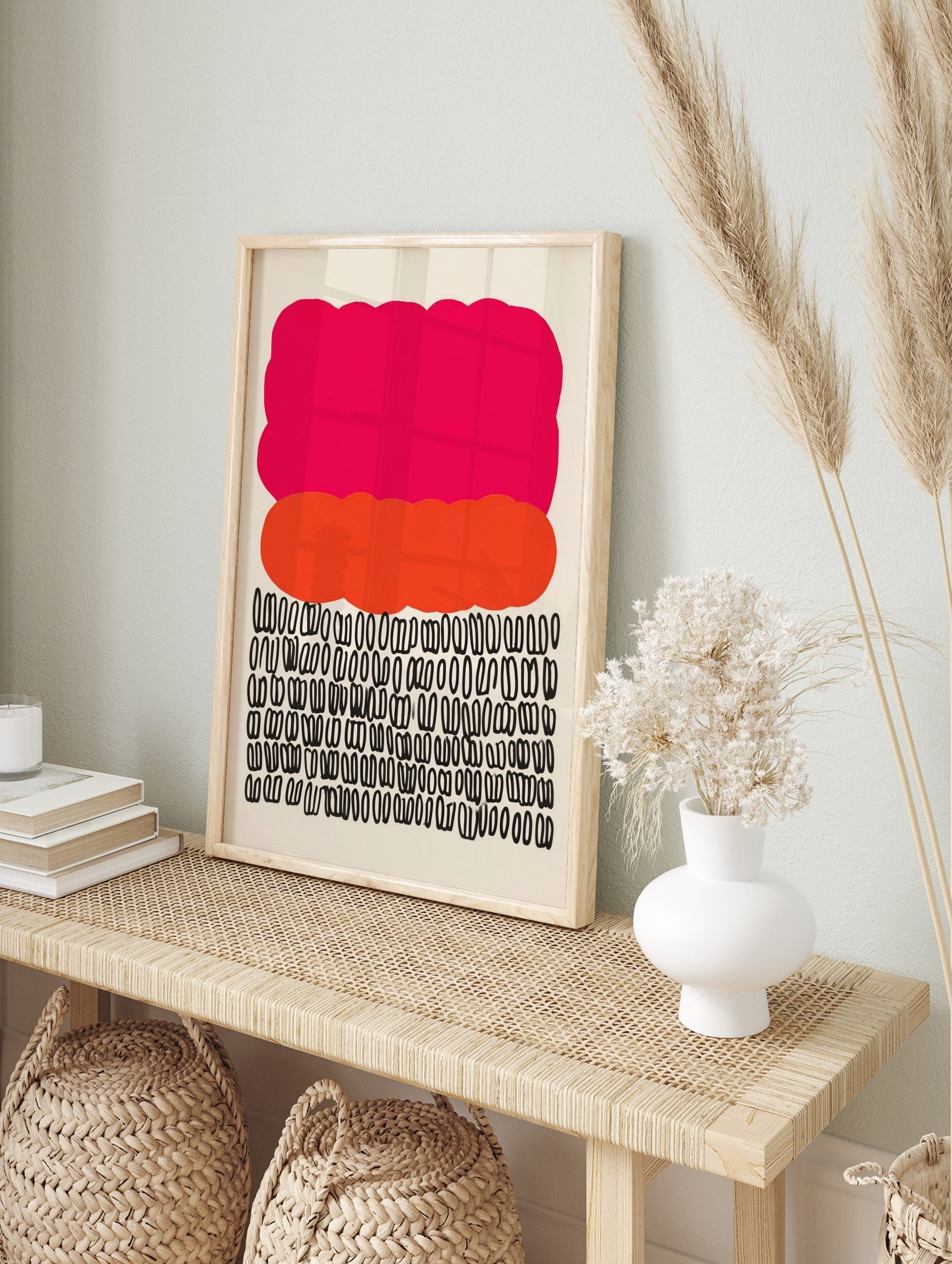 Abstract art print with a large pink cloud shape, an orange organic shape, and rows of black looped symbols, in an alternate