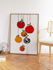 Modern fruit wall art featuring five stylized red and orange fruits with patterned details hanging from strings on a white background. - Image 2