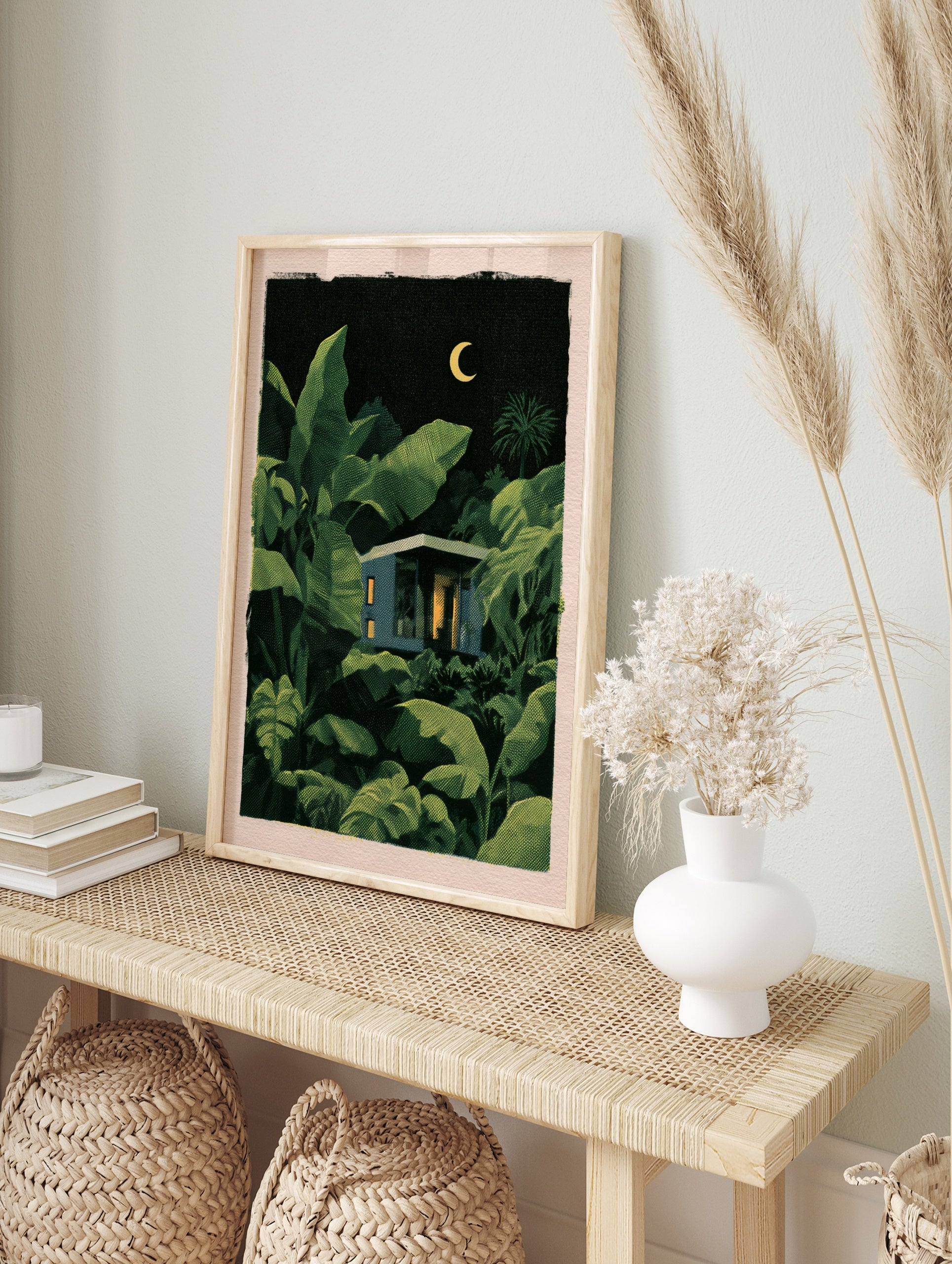 Modernist house with glowing windows nestled in a dark, lush tropical jungle under a crescent, in an alternate framed mockup