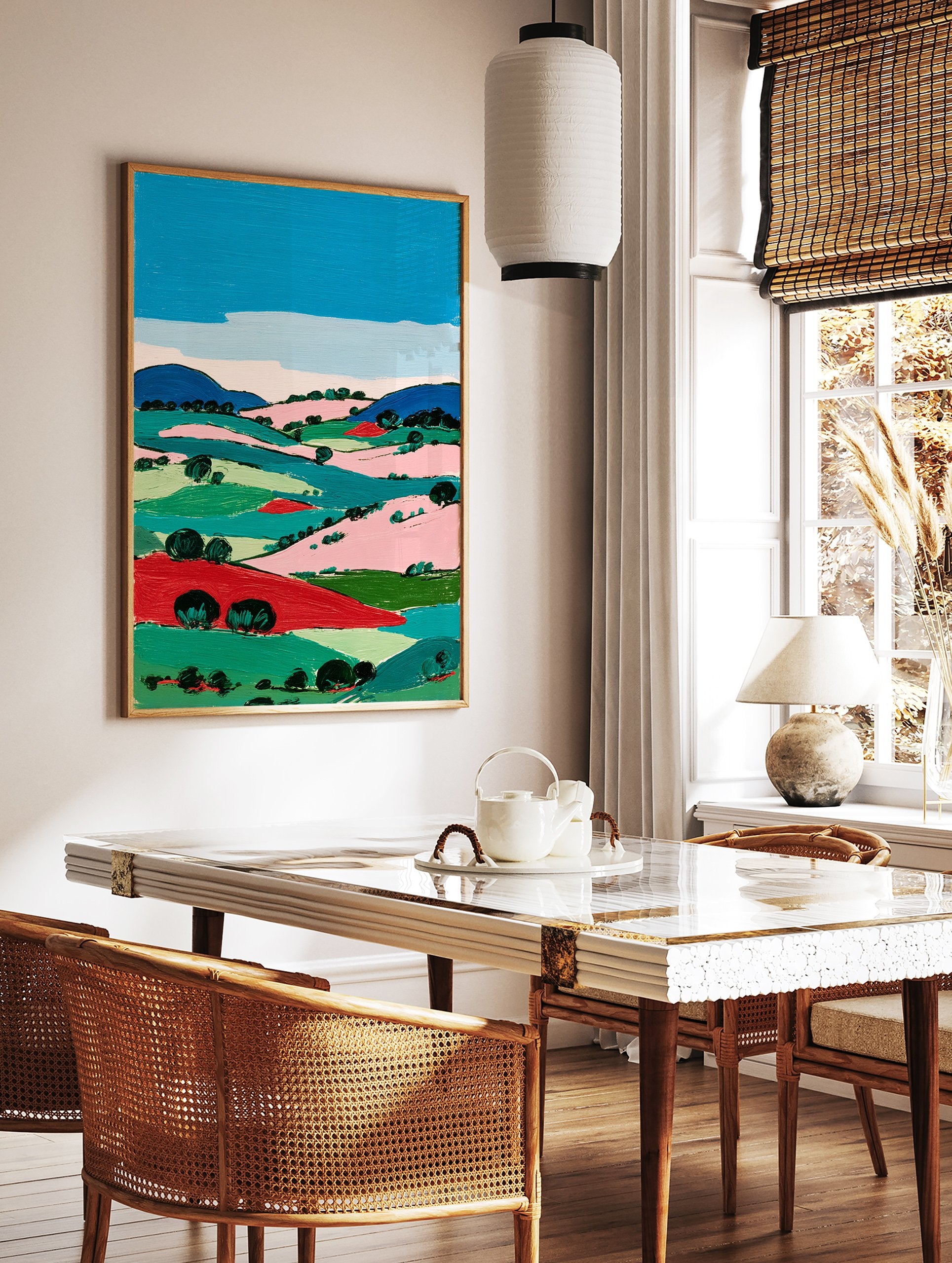 Vibrant modern landscape wall art painting featuring rolling hills, fields, and trees in bold blue, green, pink, and red colors under a blue sky. - Image 2