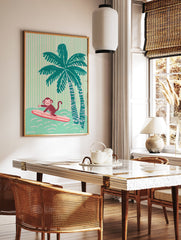 Illustrative print of a surfing monkey on a pink surfboard with teal palm trees and a striped pink and green background. - Image 2