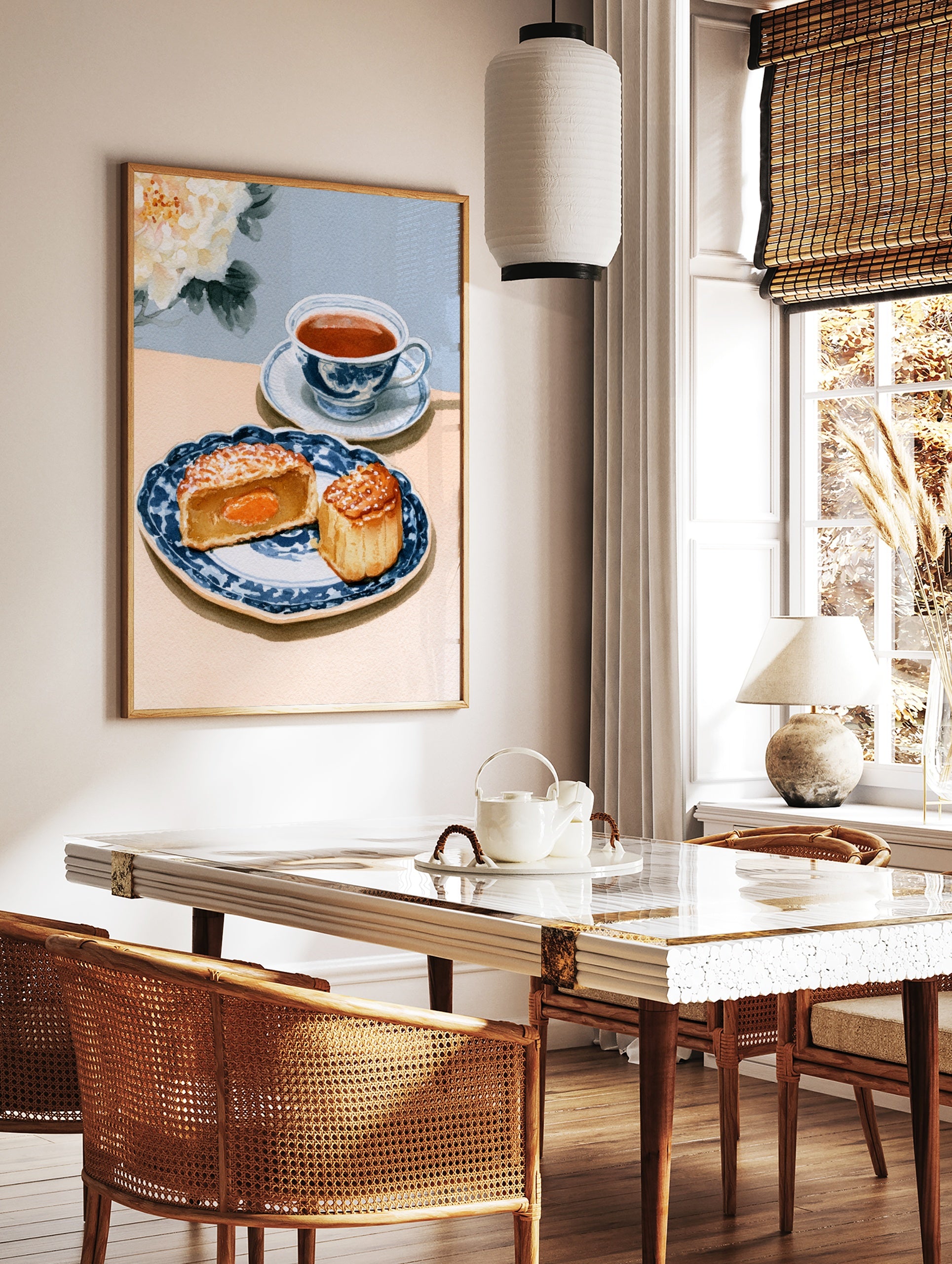 Watercolor illustration of a mooncake and teacup on a blue patterned plate with a white peony, in a styled room mockup
