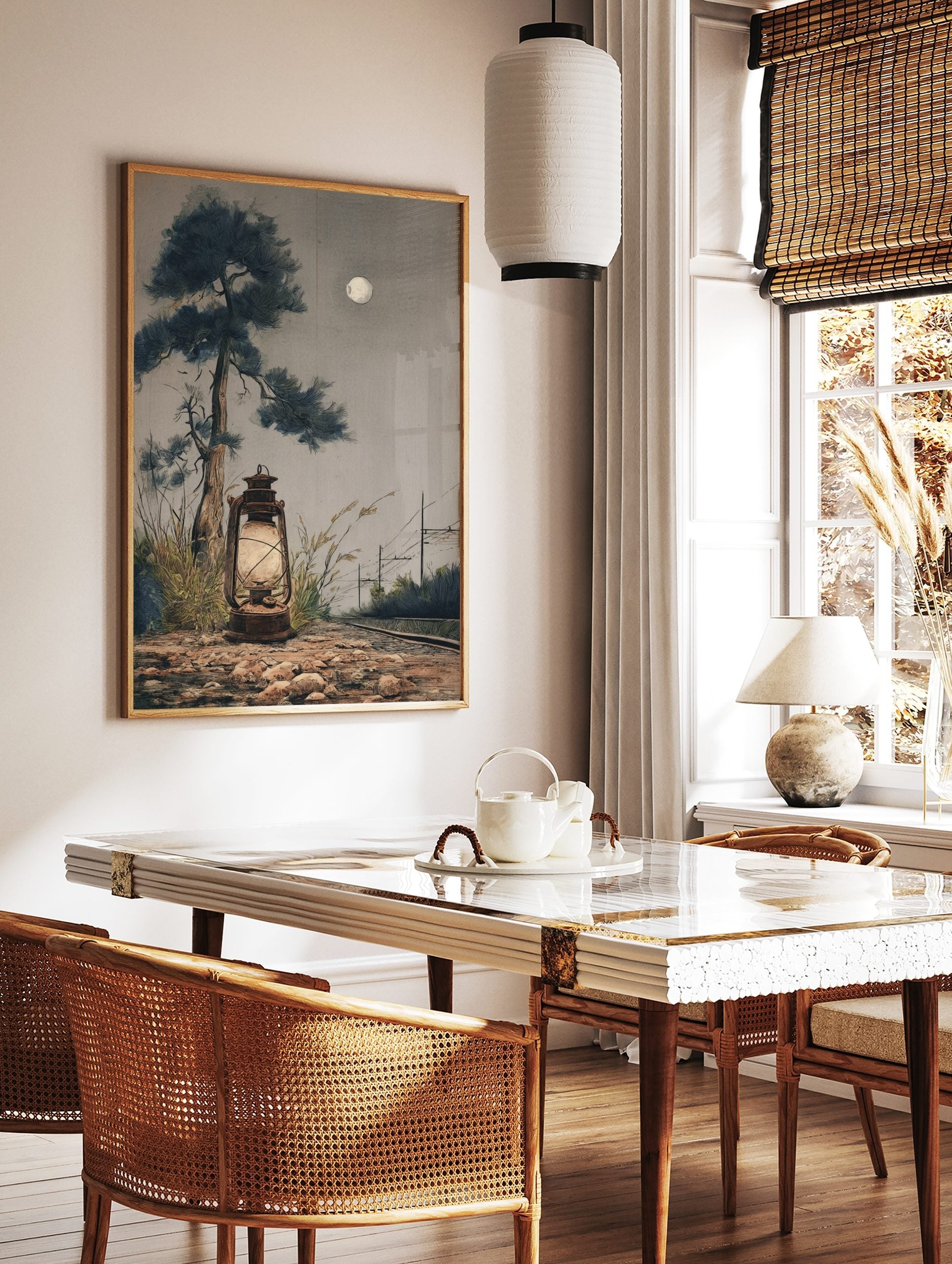 Moonlit illustrative art print of a glowing lantern, tall pine tree, railway tracks, and full moon, in a styled room mockup