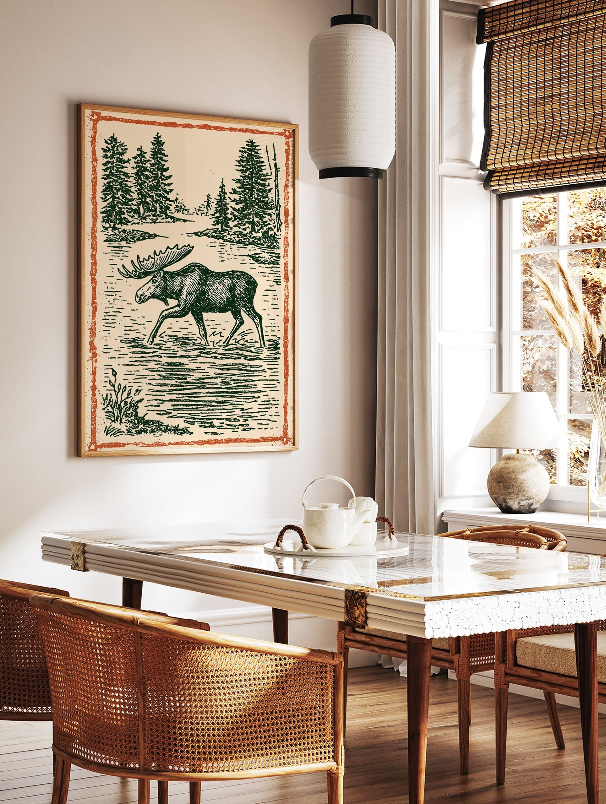 Vintage moose wall art illustration print showing a moose wading in a forest lake with pine trees and an orange border. - Image 3