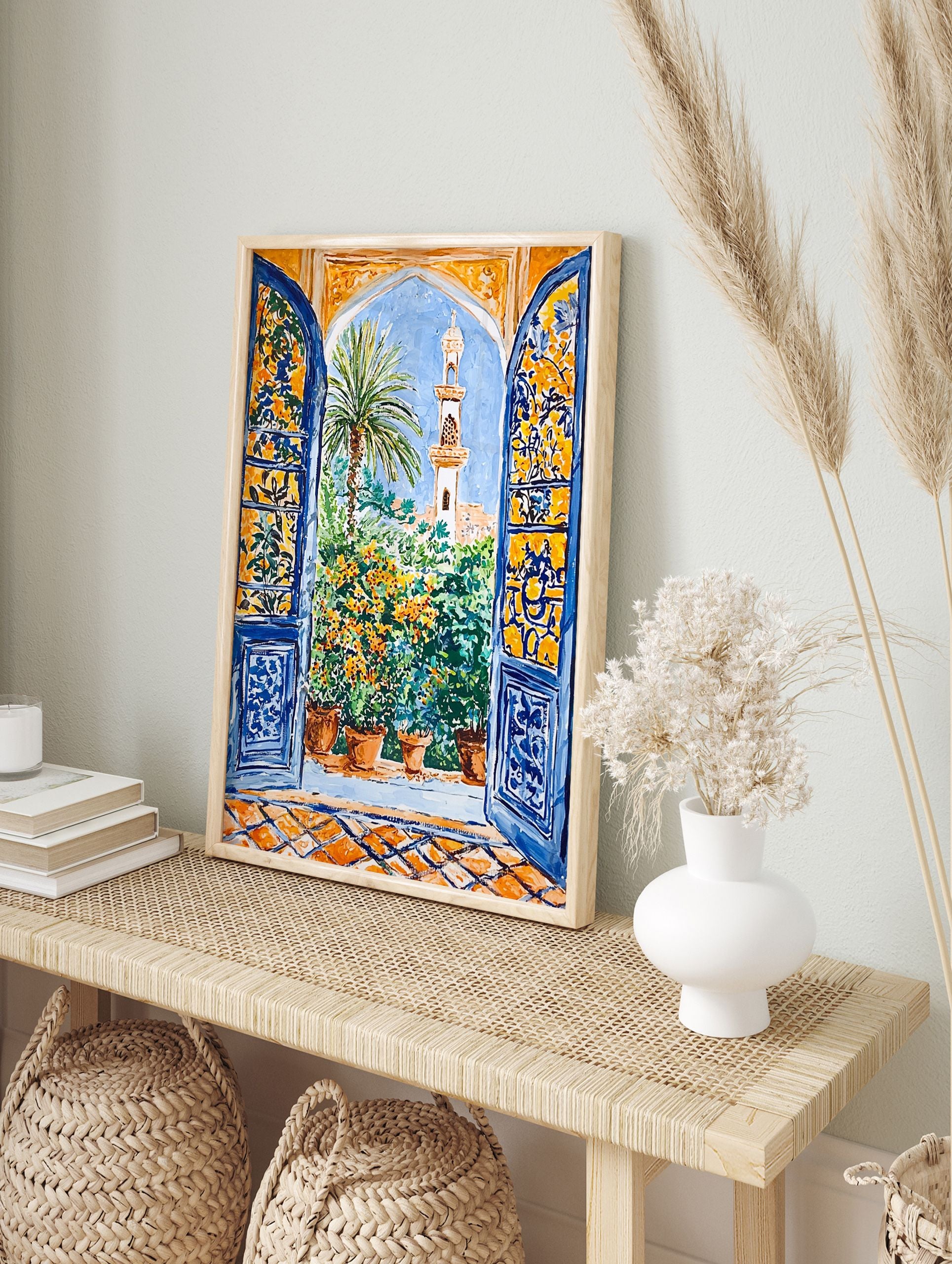 Moroccan Garden Poster showing a view through an arched blue window to a garden with a palm tree, minaret, and potted plants. - Image 4
