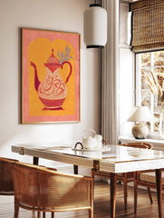 Illustrative Moroccan teapot with ornate red and white Arabic calligraphy and patterns on an orange, in a styled room mockup