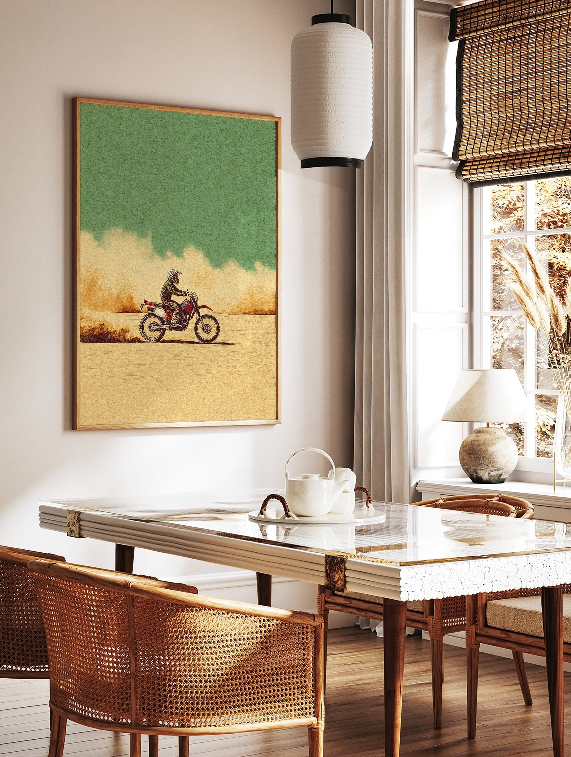 Illustrative motocross dirt bike rider on a red bike, kicking up dust in a beige desert under a, in a styled room mockup