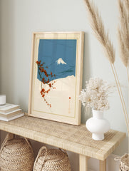 Japanese art print featuring a red flowering branch in the foreground against a blue Mount, in an alternate framed mockup
