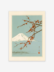 Japanese art print featuring a snow-capped Mount Fuji behind a branch of vibrant red plum blossoms on a light blue ground