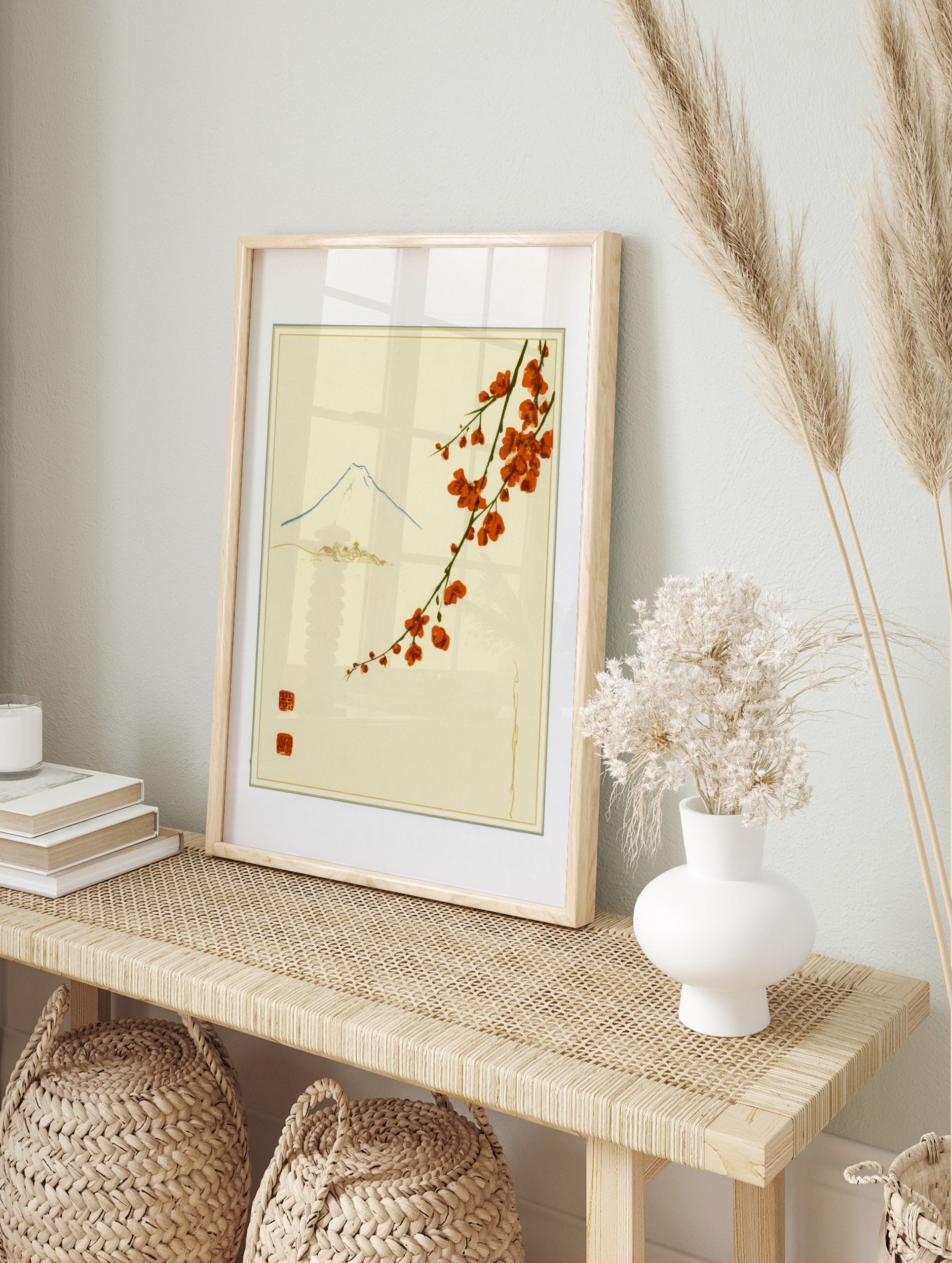 Japanese-style Mount Fuji illustration with red blossoms and red stamps on a cream, in an alternate framed mockup